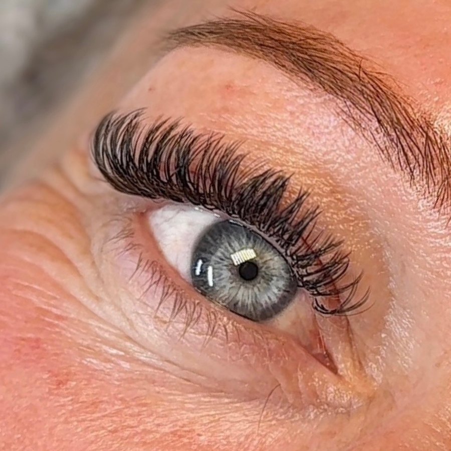 Close up of classic lash extensions applied at 9ine Studio